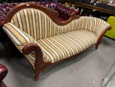 A mahogany framed chaise longue