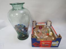 A tray of small collectables to include glass animals together with a vase containing glass pieces