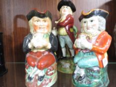 Three 19th century type character jugs