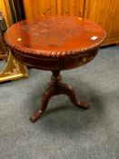 A mahogany carved pedestal table