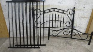 A black and gold metal bed frame