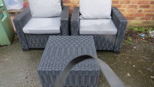 Two plastic rattan garden chairs and table (3)