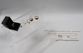 A small collection of yellow metal jewellery to include a seed pearl and blue topaz style pendant