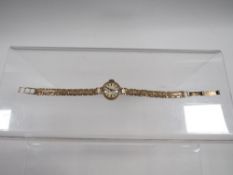 A hallmarked 9 carat gold Caravelle wristwatch approx weight 13g