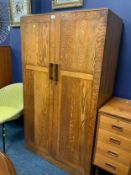 A vintage oak two drawer cabinet