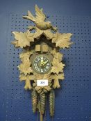 A modern triple weight cuckoo clock