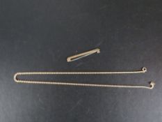 A 9ct necklace approx weight 4.3g together with a bar brooch stamped 9ct with a stainless steel