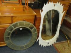 A modern circular wall mirror together with an unusual faux elk horn style framed wall mirror (2)
