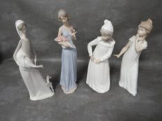 Three tall Nao figurines together with a matt Nao figurine