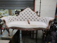 An Edwardian three seater parlour couch, with carved cabriole legs, A/F - broke leg