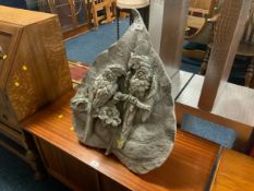 A modern resin Parrott easel back plaque