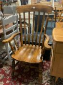 An antique Windsor kitchen armchair