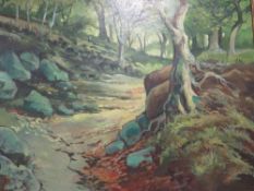 A gilt framed impressionist style oil on board depicting a woodland pathway, signed lower left Tom