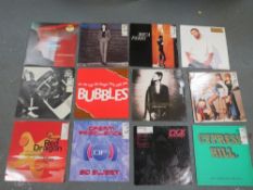 A tray of assorted LP records to include Kid Frost and Red Dragon etc