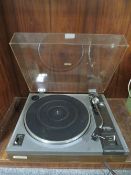 A Pioneer PL--1120 belt drive turntable