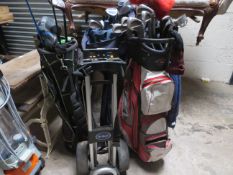 Four assorted golf bags containing a selection of golf clubs to to include Ping, Cleveland, Wilson e