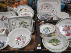 Four trays of assorted larger pieces of Portmeirion to include mixing bowls, serving dishes,