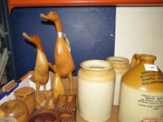 A tray of treen to include duck figures together with stoneware jugs, ceramics etc