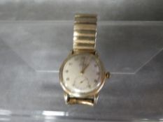 A gentlemens Omega gold plated wristwatch with automatic bumper movement on later unbranded