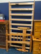 A honey pine single bed frame