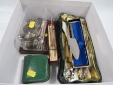 An assortment of cutlery etc to include a small hallmarked handled cake slice