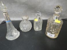 Four antique silver mounted cut glass scent bottles/ decanters (4)