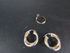 A pair of two colour earrings stamped 375 approx weight 4.4g together with a single earring