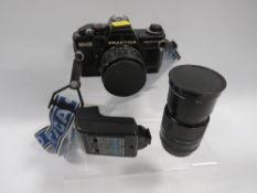 A vintage cased Pratika camera and accessories