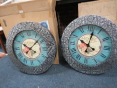 Two large decorative modern wall clocks with box