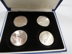 Canada 1959 silver dollar, along with 2014 maple leaf 1oz coins x 2 and 2014 eagle 1 oz (4)