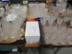 Five trays of assorted glassware to include wine glasses