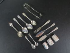 Three small hallmarked silver vestas to include an early Victorian example together with silver