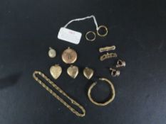 A quantity of yellow metal jewellery, including a Victorian mourning locket