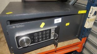 A combination and key locking safe
