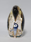 A Royal Crown Derby penguin and chick paperweight with gold stopper