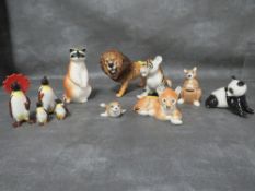 A collection of assorted animal figures to include Beswick and Russian examples