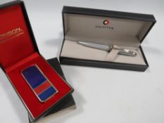 A boxed Sheaffer 100 stainless steel ballpoint pen and a boxed Ronson lighter (2)