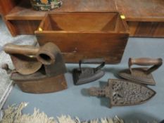 A collection of vintage flat irons etc