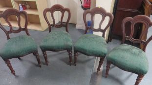 A set of four Victorian mahogany dining chairs