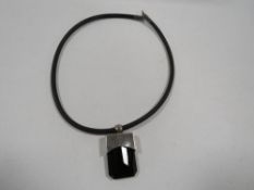 A silver mounted choker necklace