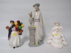 A Royal Doulton figurine Biddy Penny Farthing, together with a Coalport figurine and a large