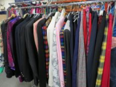 A rail of assorted ladies clothing, various style and makes comprising skirts, jackets, knitwear