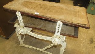 An antique cast iron press made by Whitaker & Co