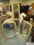 Three assorted floral / gilt framed mirrors