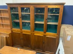 A large vintage mahogany glazed library bookcase