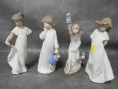 Four assorted Nao figurines