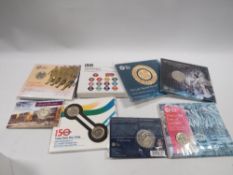 A collection of Royal mint uncirculated coin packs consisting of 1 pound coin 2016, 2 pound coins