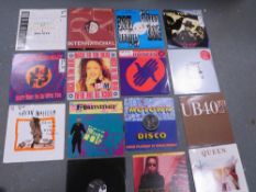 A tray of assorted LP records to include UB40 and Queen