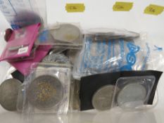 A tub of assorted vintage coinage