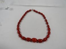 A vintage cherry amber necklace 43g